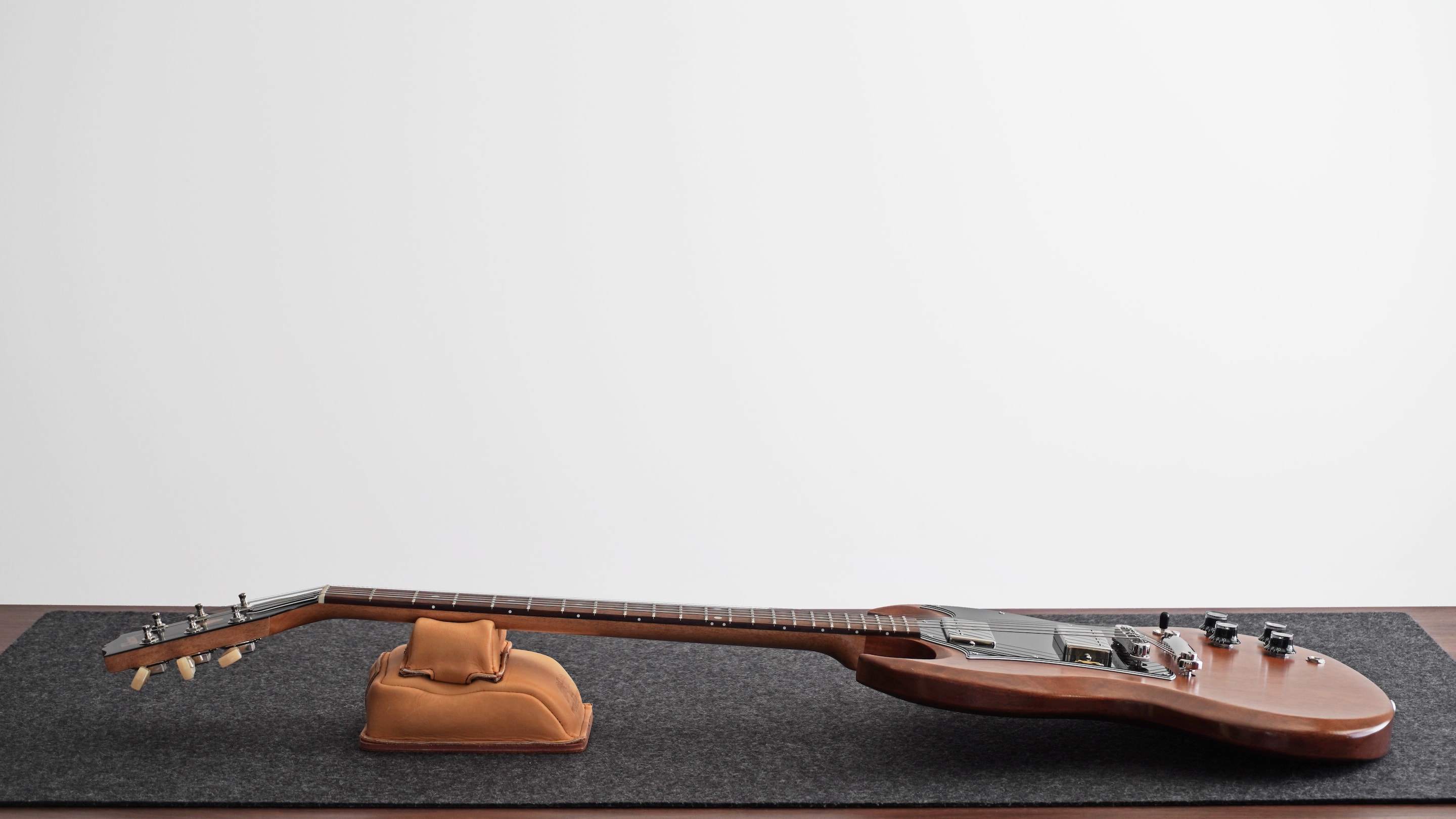 A guitar on a workbench